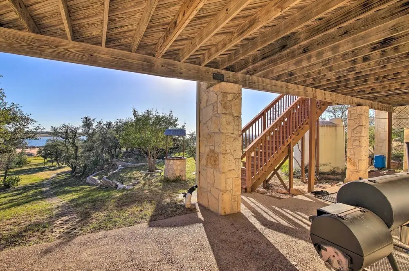 Sunny Lakefront Escape w/ Private Beach & Deck