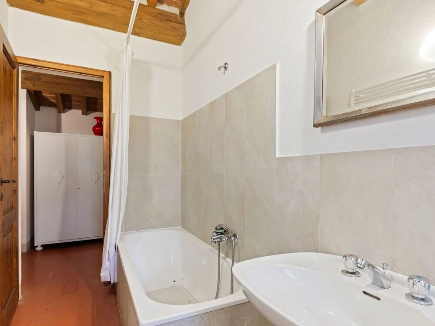 House on the Property Next to an Ancient Villa With a View of the Hills and Pool