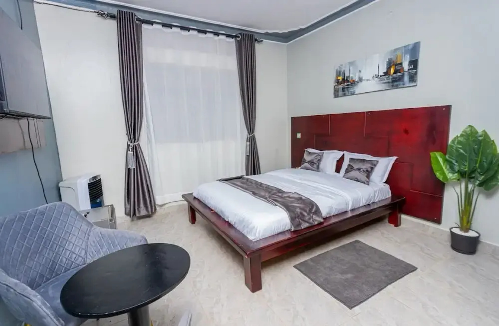 The Den Soroti White