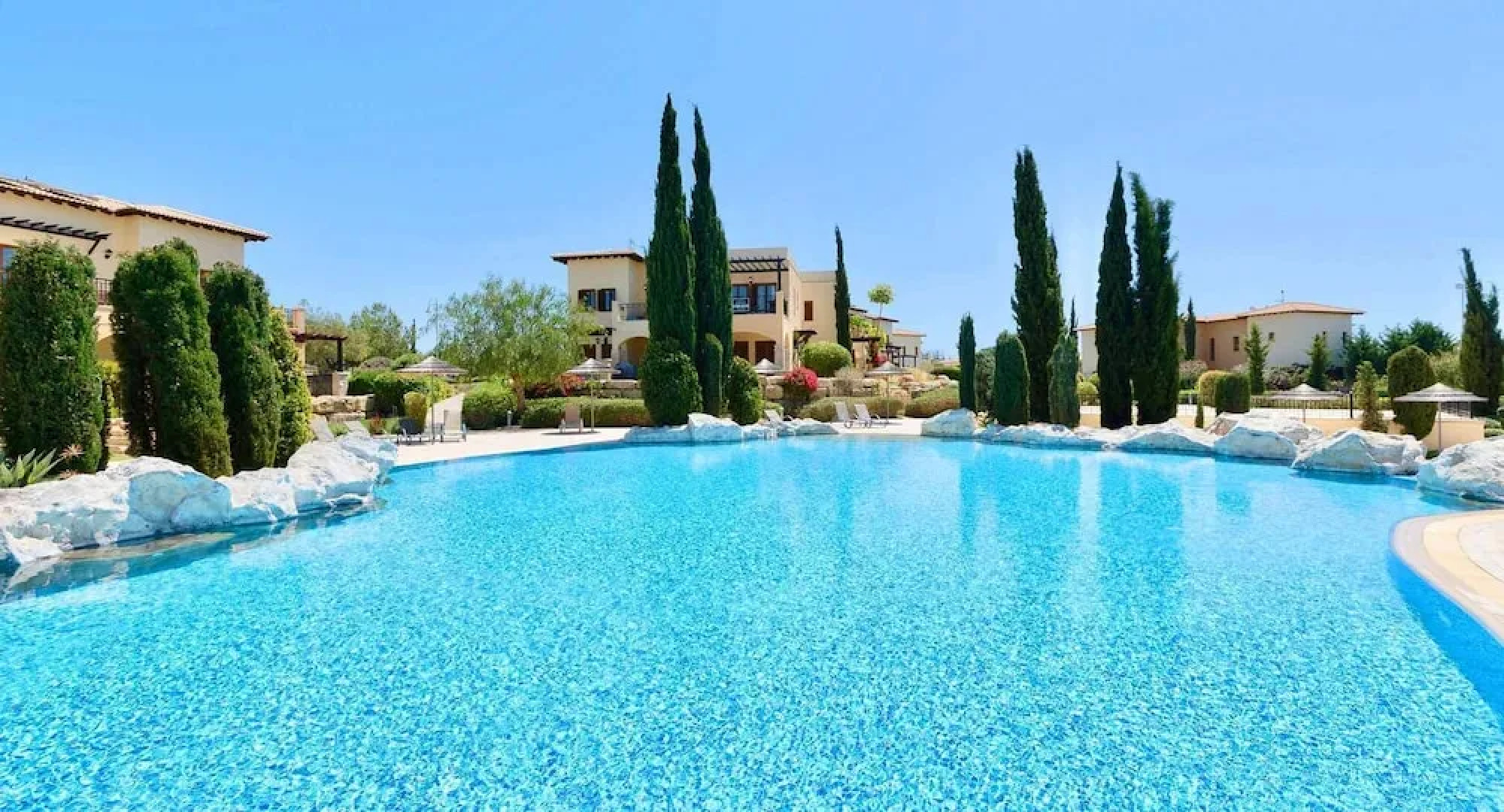Charming 2 bedroom ground floor apartment 'CB01' - with private garden, communal pool and resort facilities, Theseus Village on Aphrodite Hill