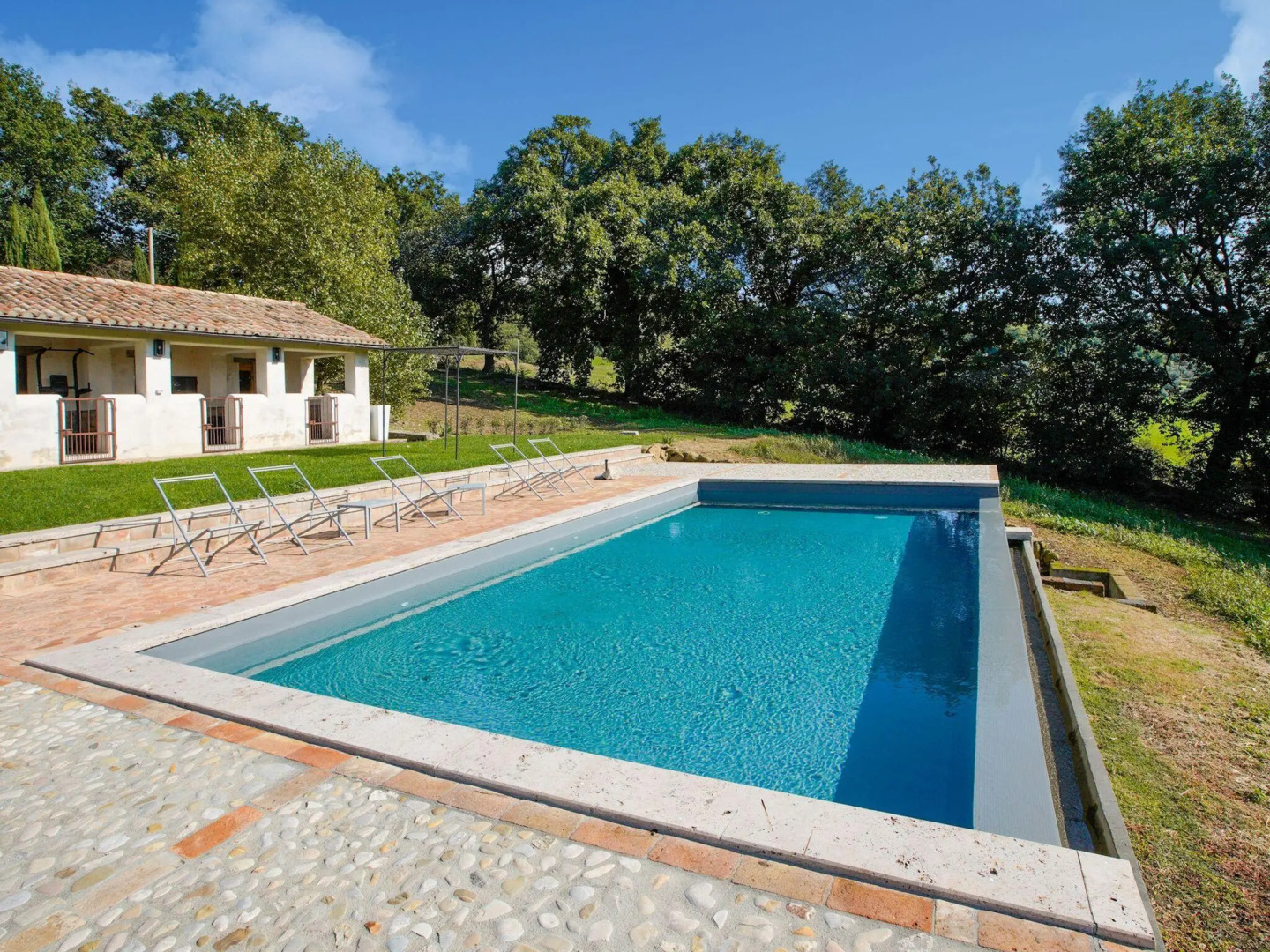 Completely renovated former farmhouse with infinity pool