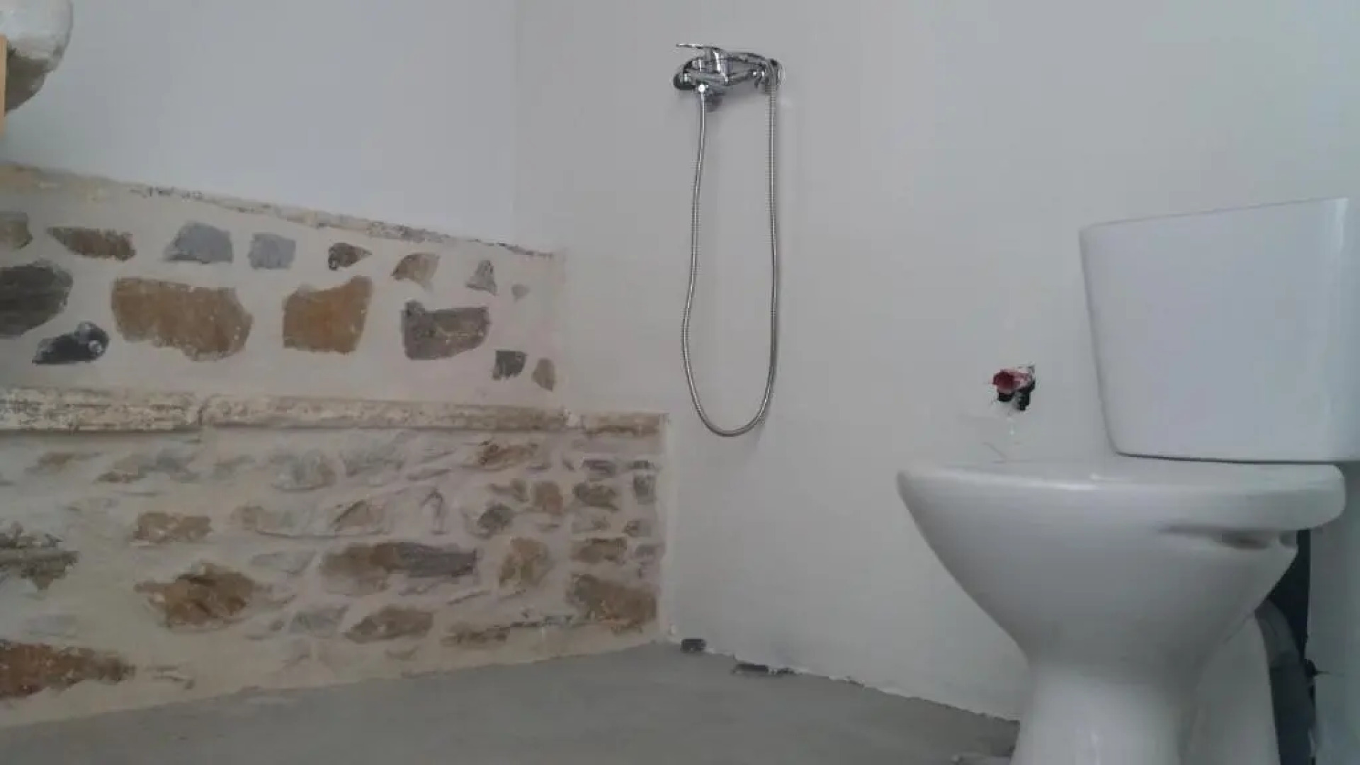 "Fasolas square house" is located 30 stairs up from the main road and it is in the old market "fasolas" and next to the museums