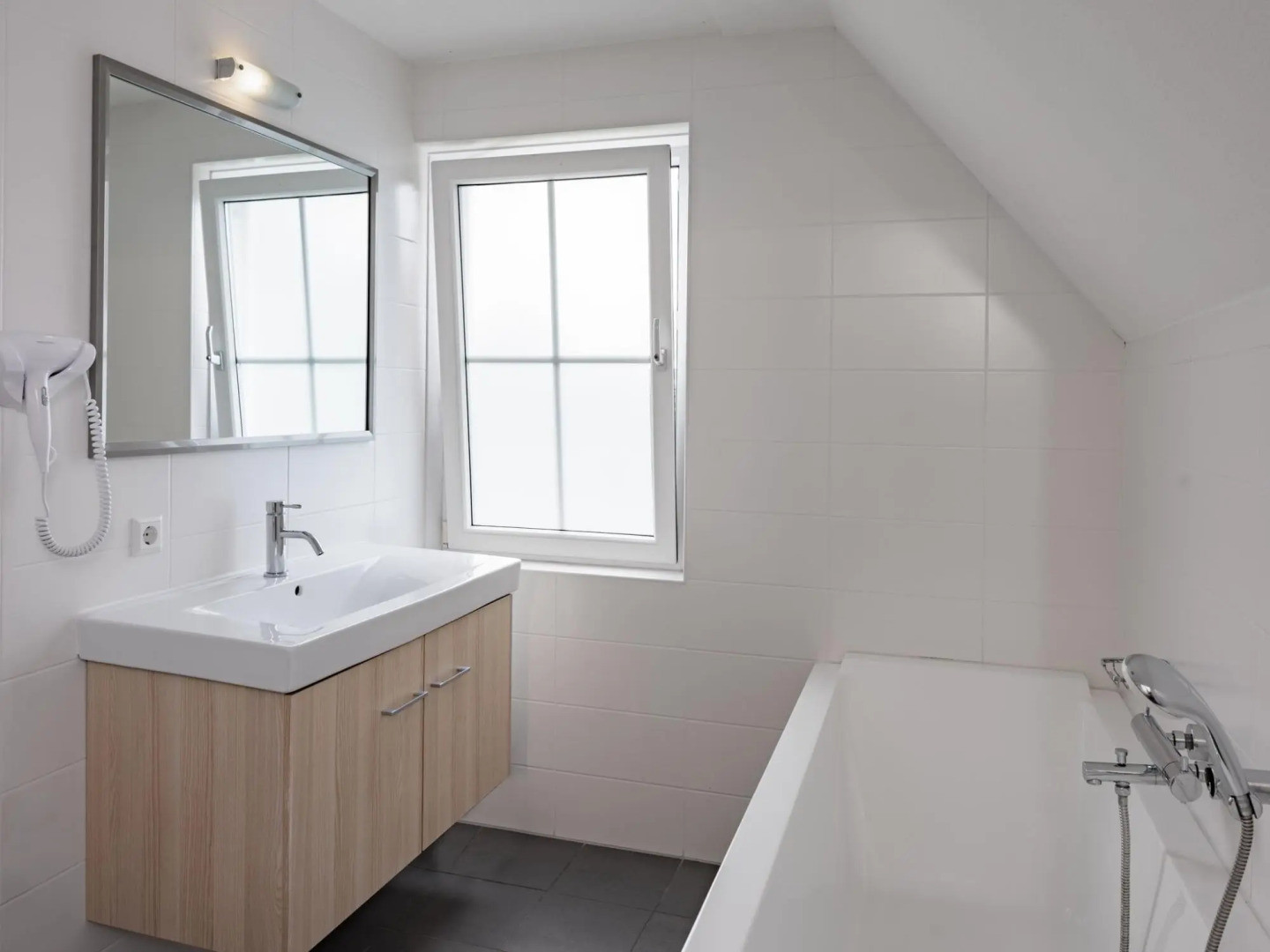 Restyled villa with sauna, in a holiday park, 400 m. from the beach