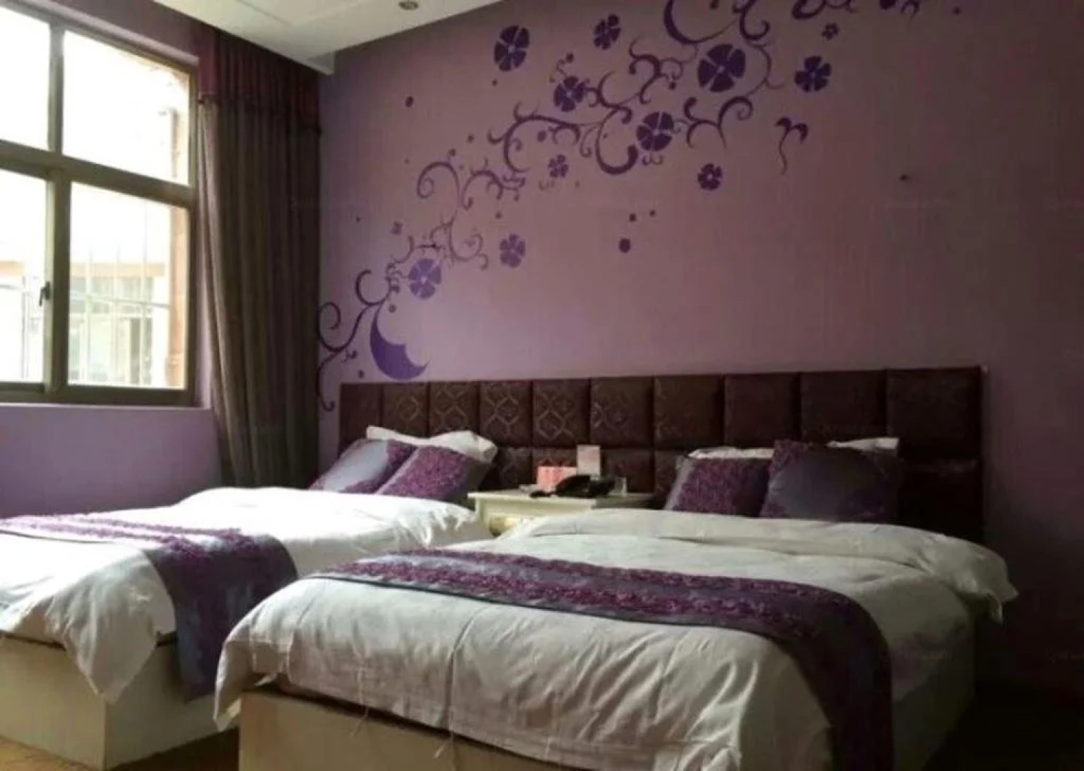 Qujing Ruixin Business Hotel