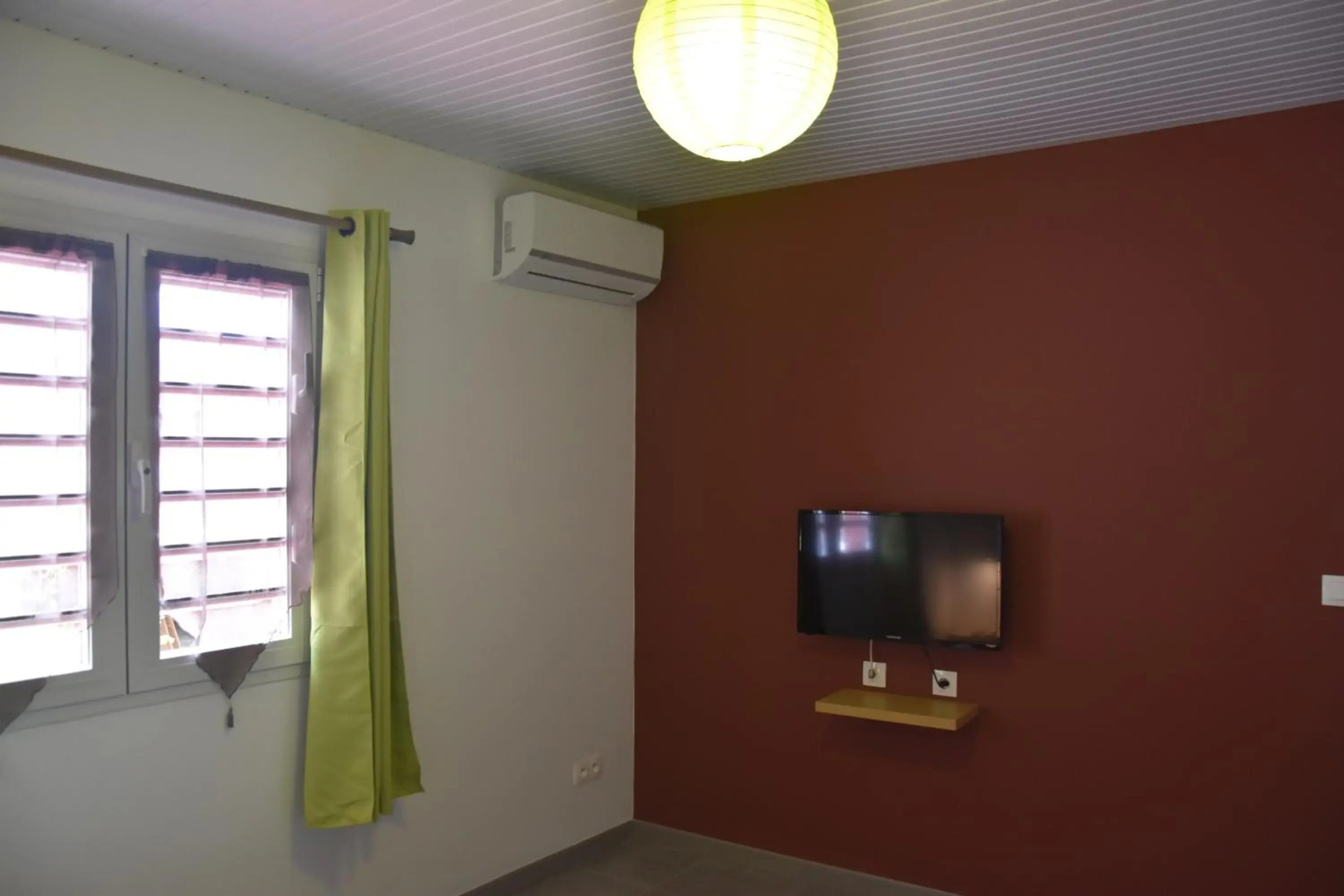 Haut de villa dans son écrin de verdure