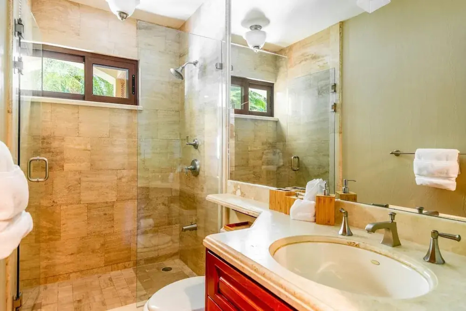 Stylish Split-Level Condo with a Shaded Terrace, Direct Beach Access, and Resort-Style Community Amenities