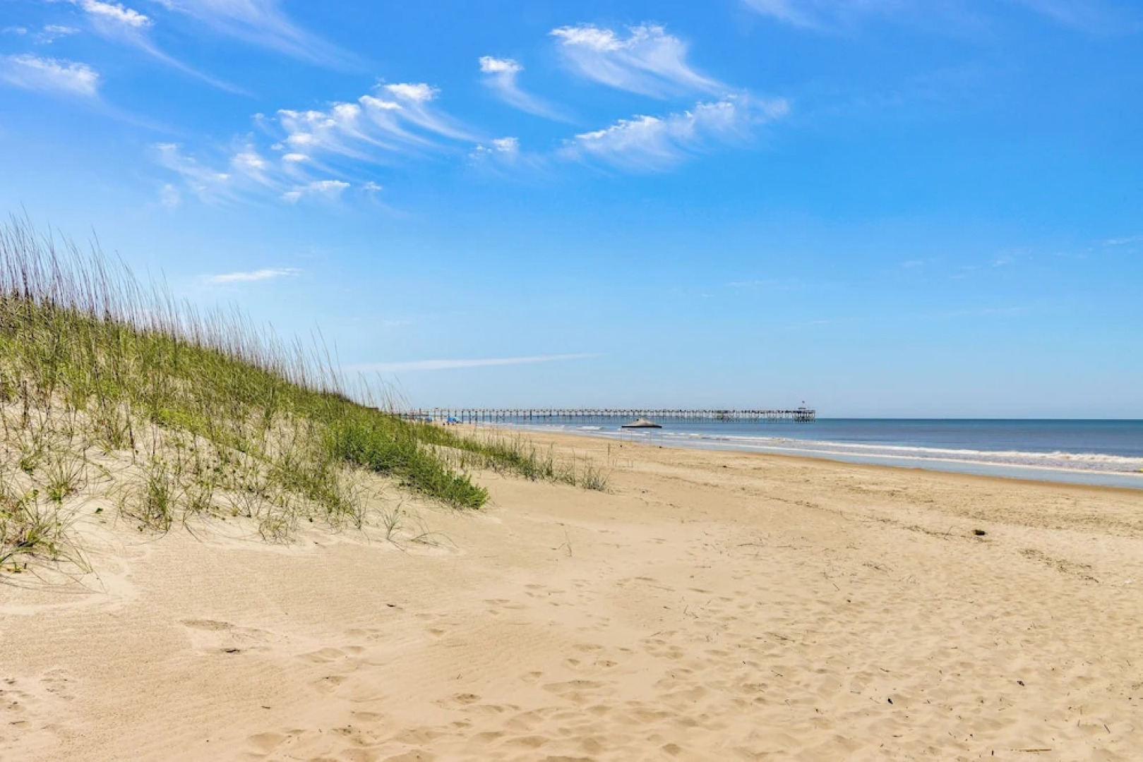 Oak Island Condo w/ Ocean View: Steps to Beach!