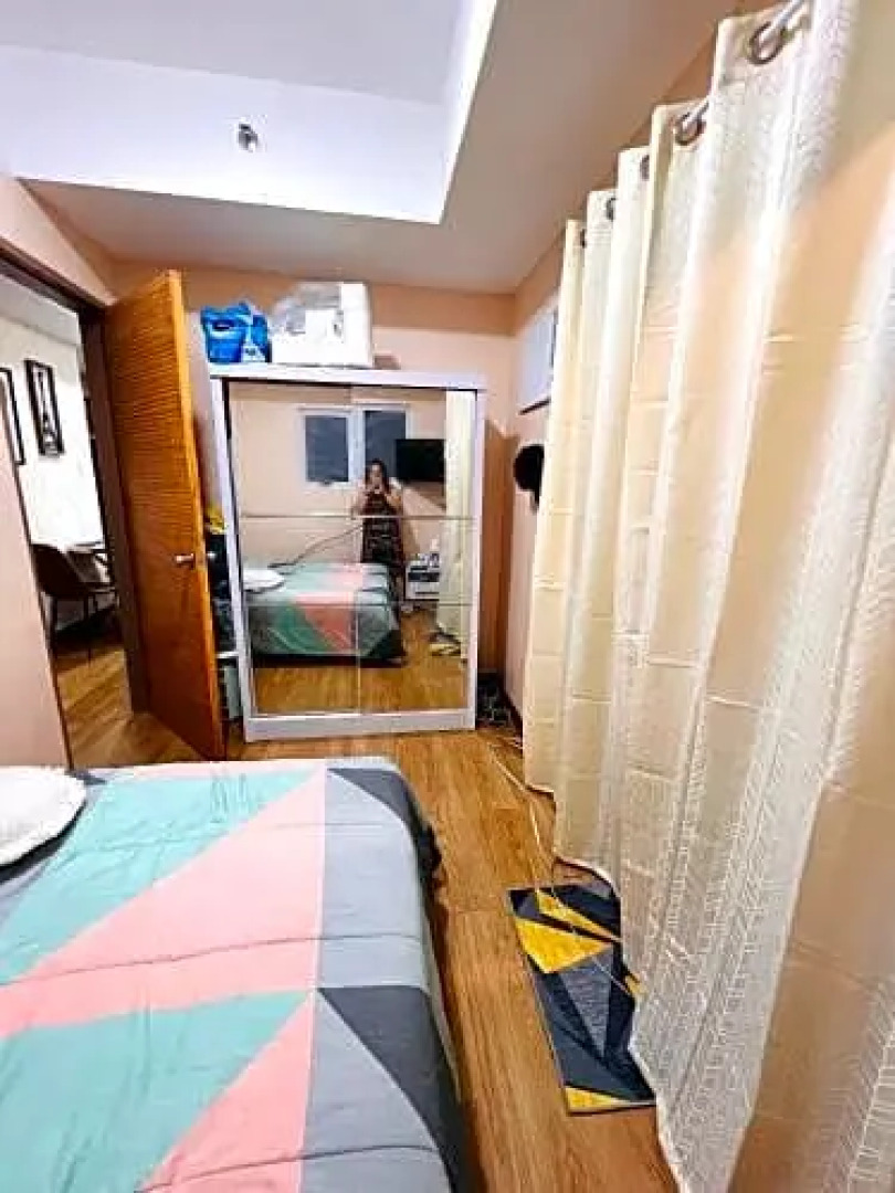 new fully furnished cozy 2 bedroom staycation condo unit with pool