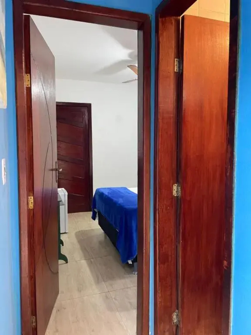 Suíte com varanda vista piscina