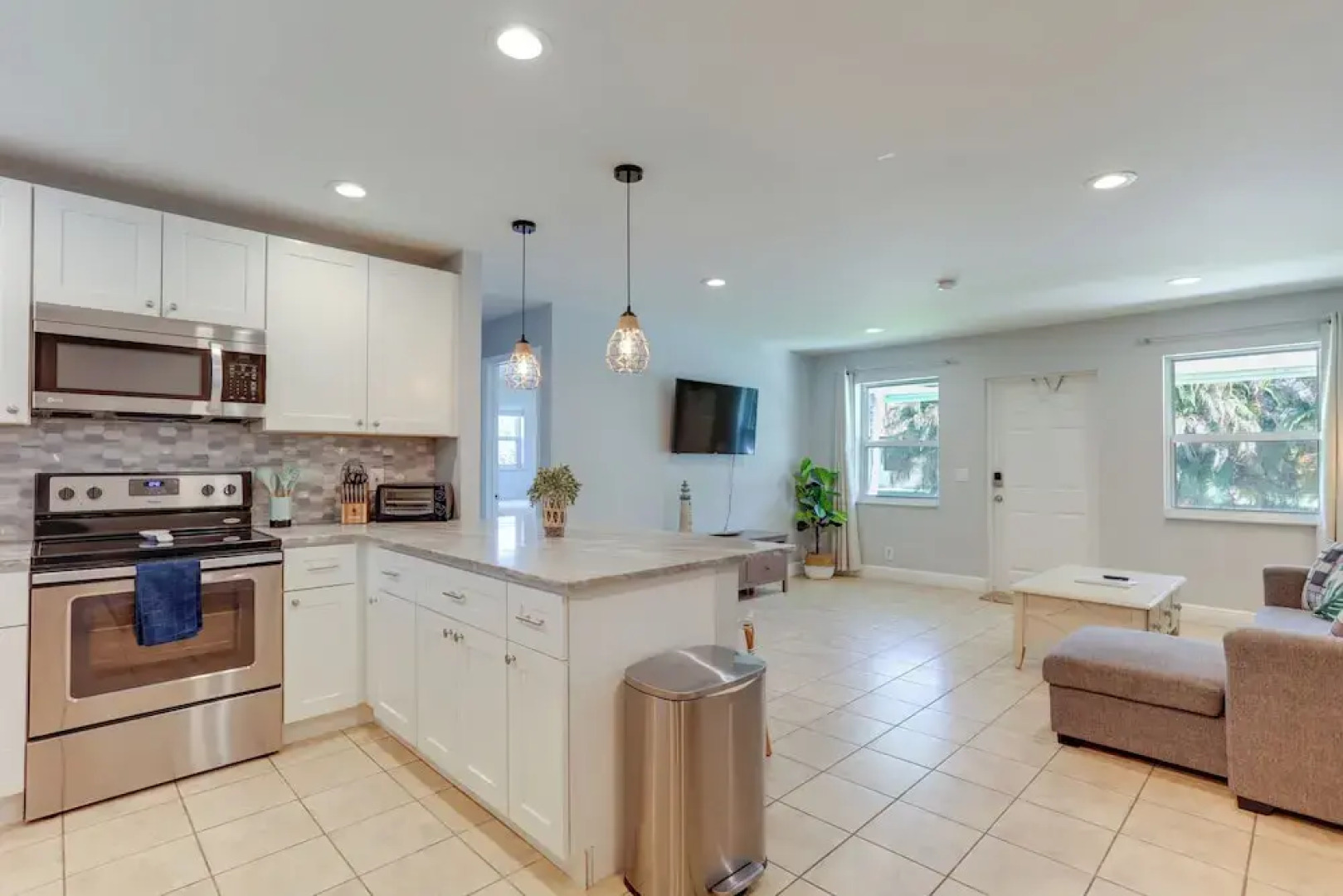 Pet-friendly Palm Beach Pad - 1 Mi to the Ocean!