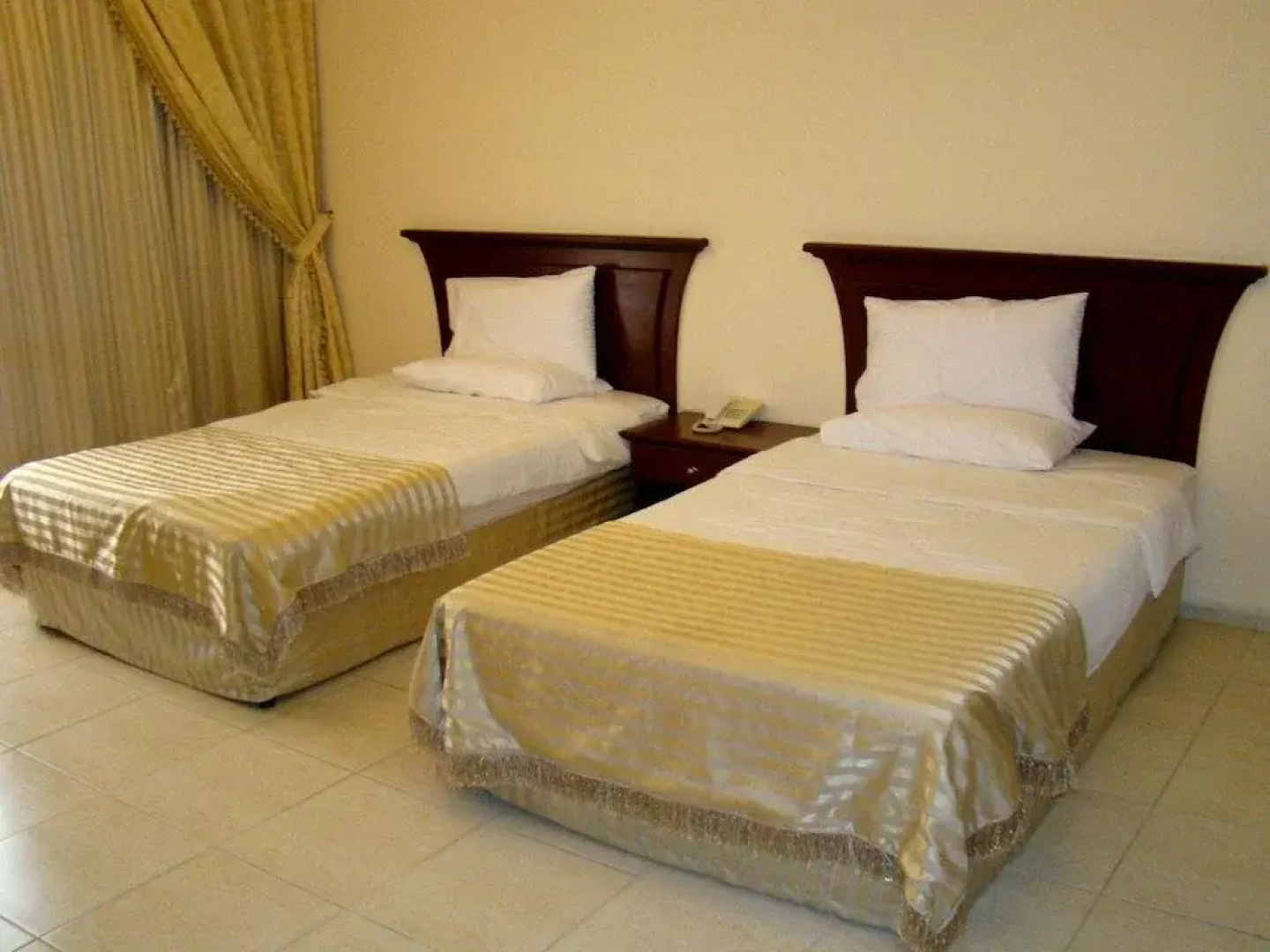 Queen Inn Hotel Apartments