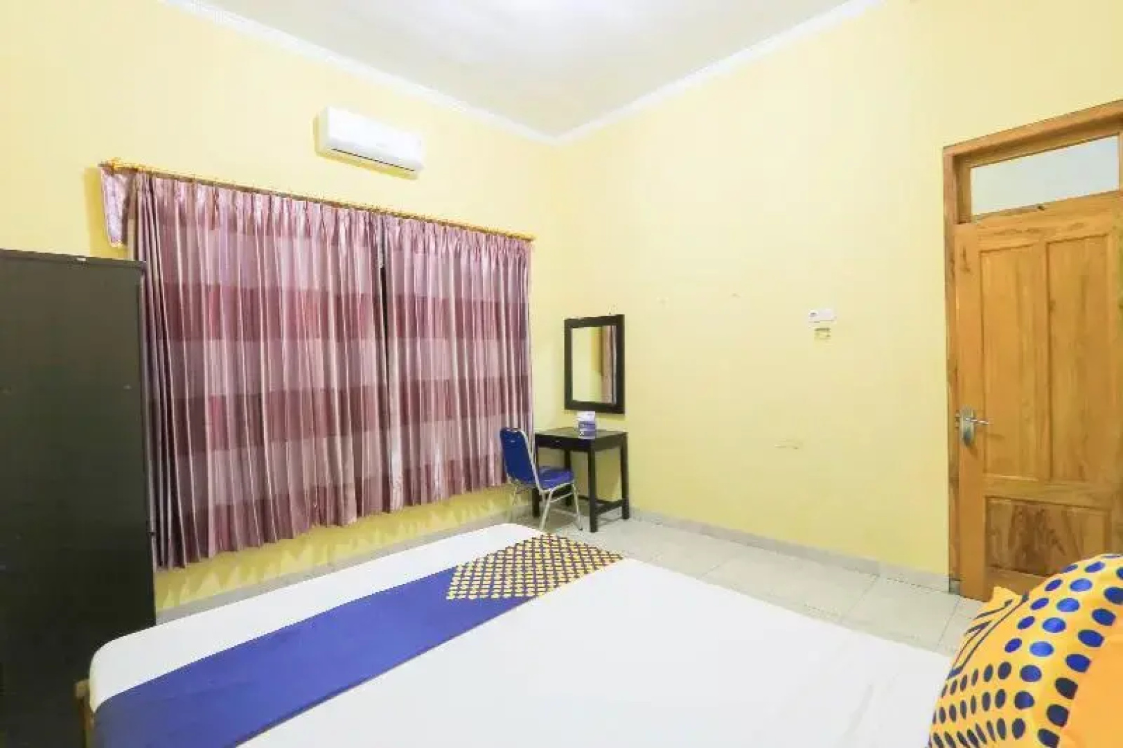 Wallet Family Residence Syariah by OYO Rooms