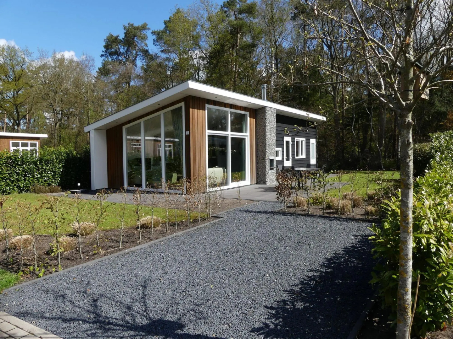 Modern Chalet With A Barbecue At The Forest