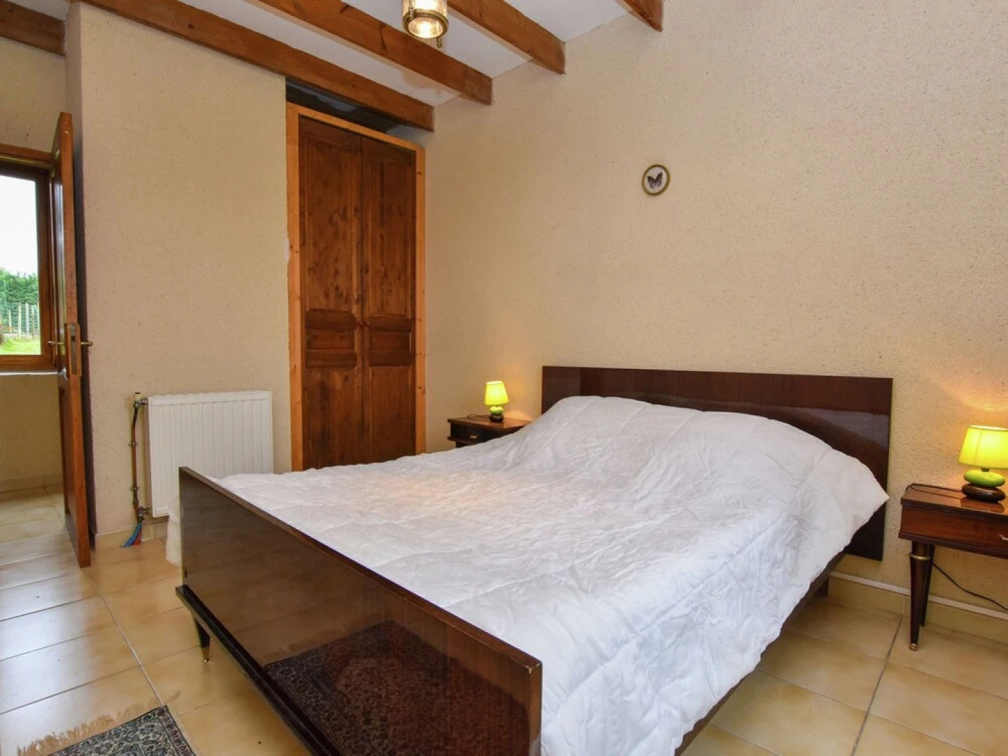 Lovely holiday home in Biron with fenced swimming pool