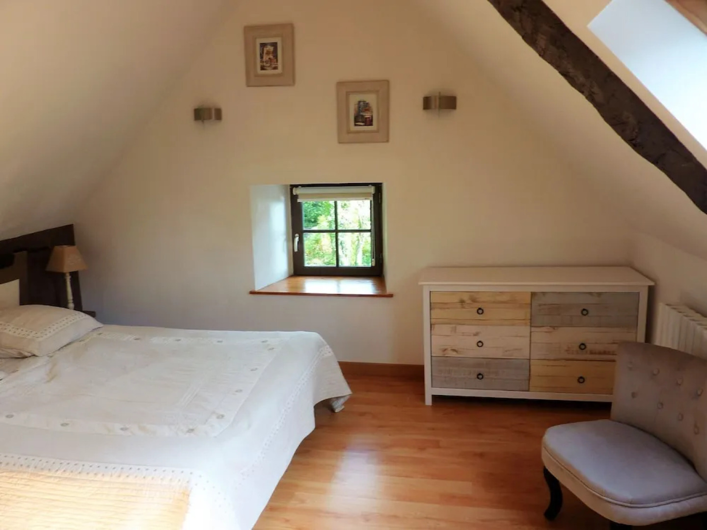 17th century Breton cottage with modern interior on the edge of a forest.
