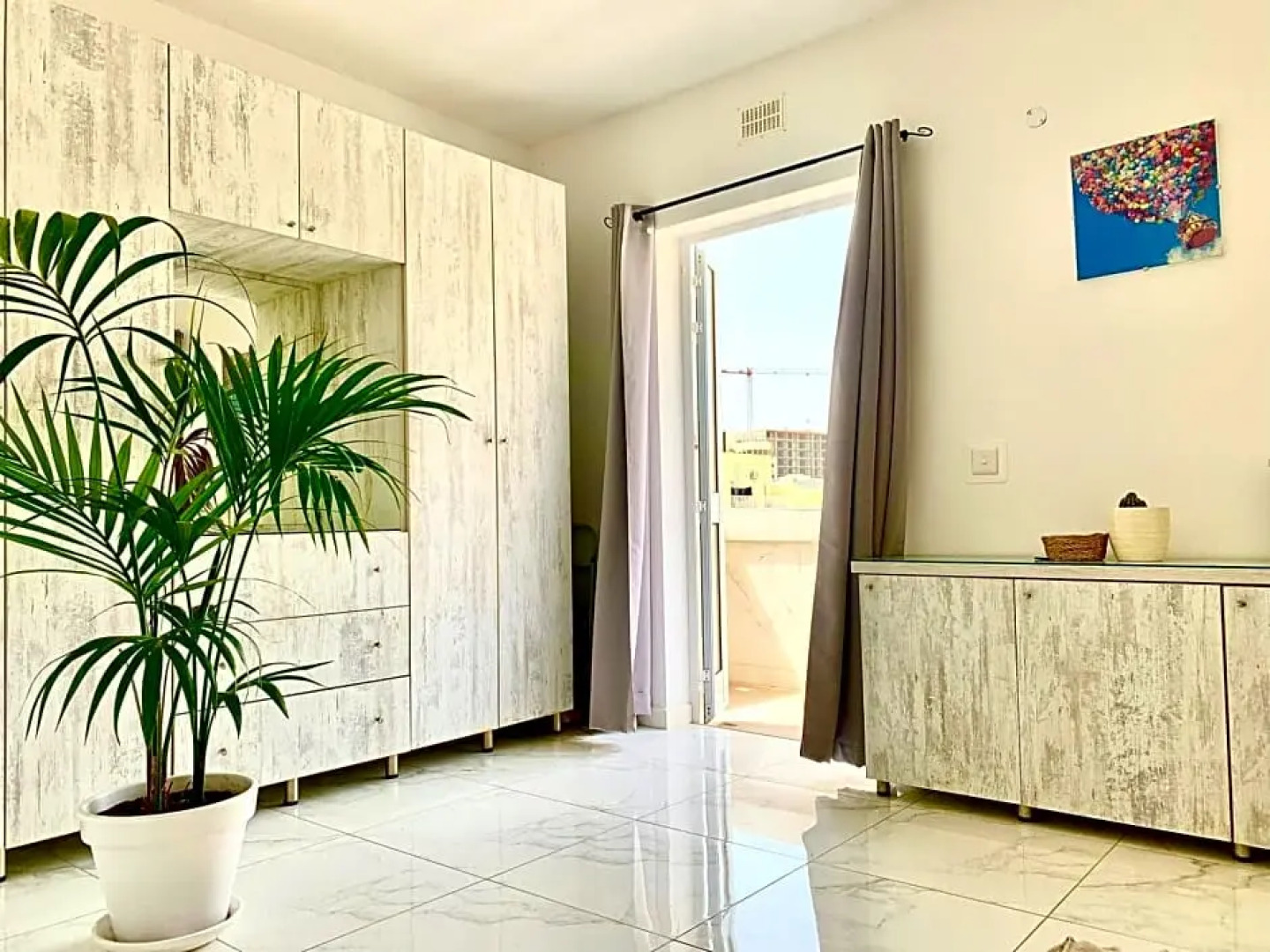 Private bedroom with balcony in a shared apartment at the Bay of Xlendi