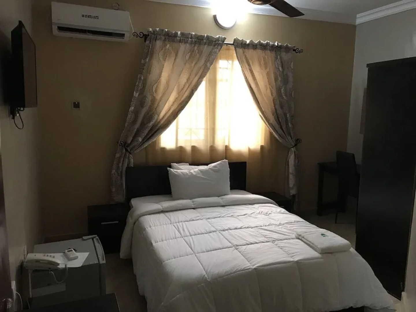 Unifirst hotel & suites