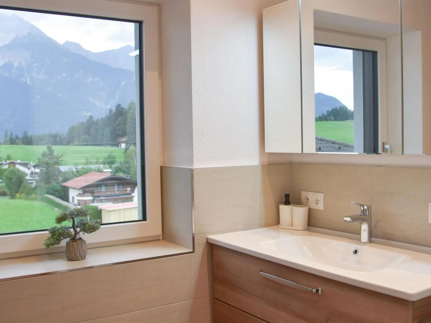 Apartment in Götzens with roof terrace and e-car charging station