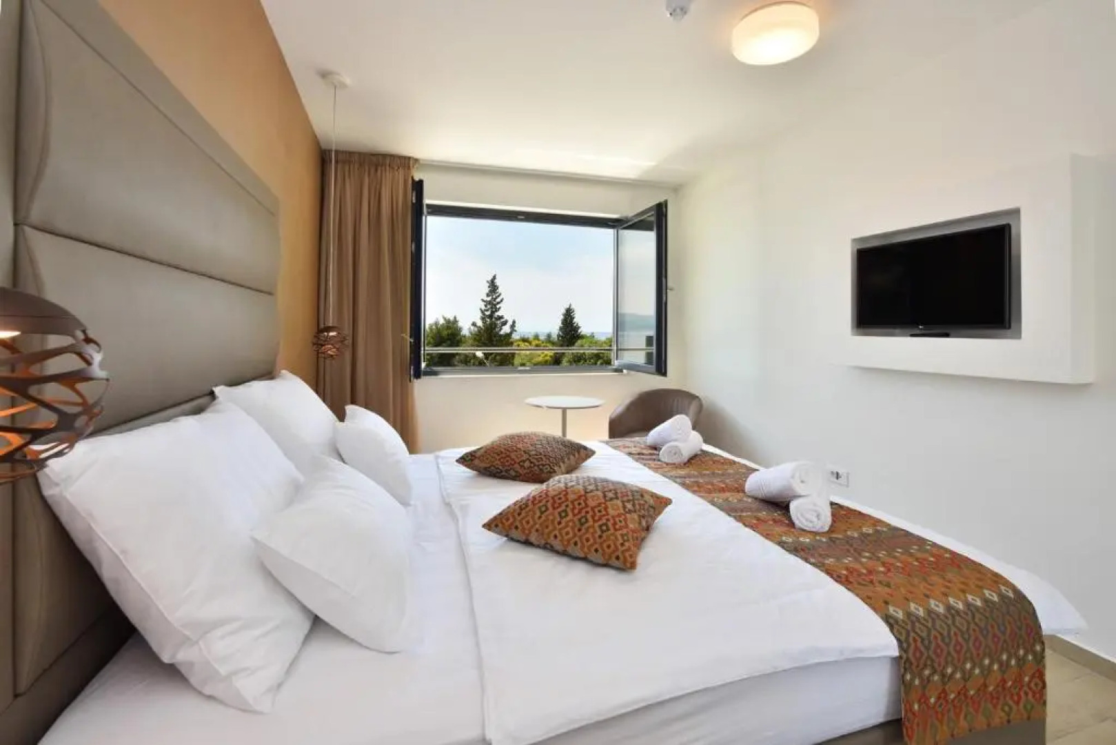 Luxury, seafront Villa Petra with heated pool only 50m from beach