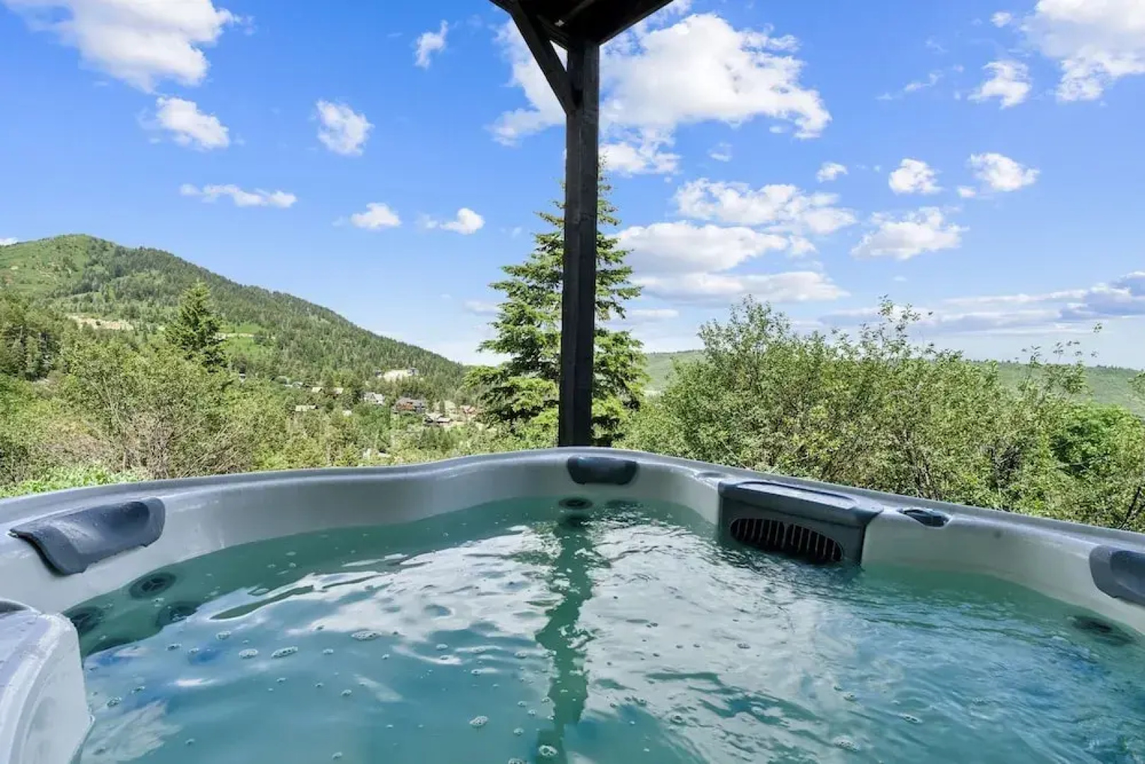 Tranquil Mountain Retreat Scenic Views & Hot Tub 4 Bedroom Home by RedAwning