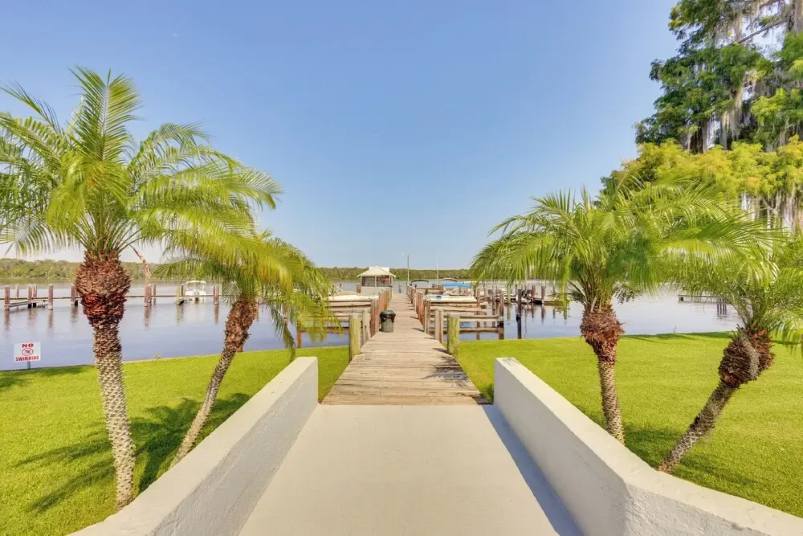 Riverfront Weleka Condo w/ Dock & Pool Access
