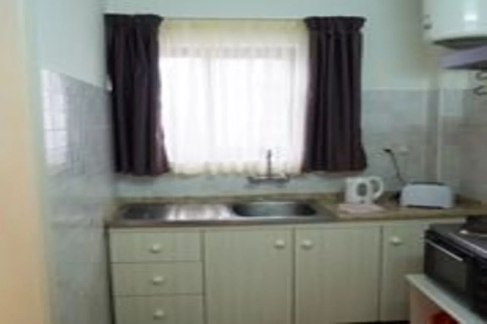 Huli Hotel & Apartments