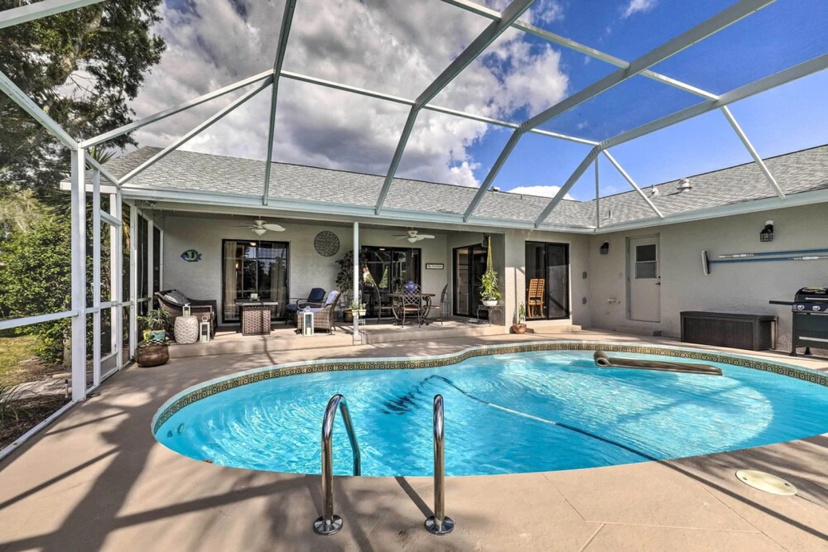 Palm Harbor Home w/ Pool & Golf Course Views!