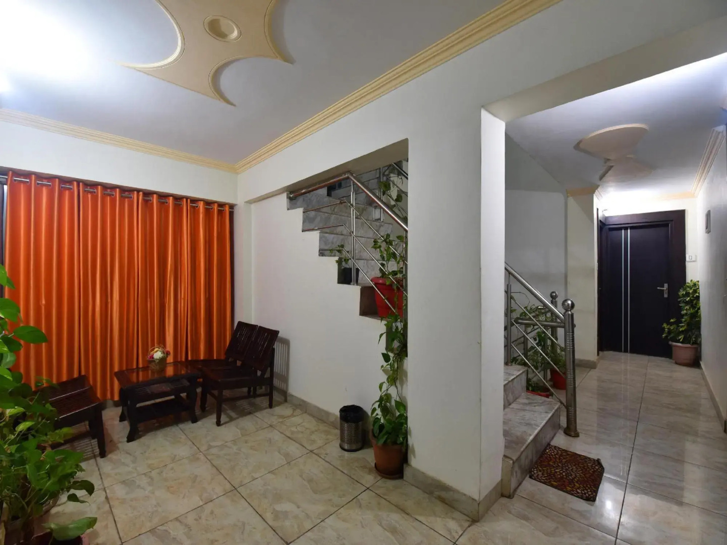 OYO 28555 Sandalee Comforts