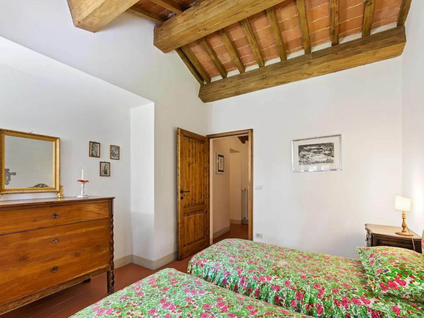 House on the Property Next to an Ancient Villa With a View of the Hills and Pool