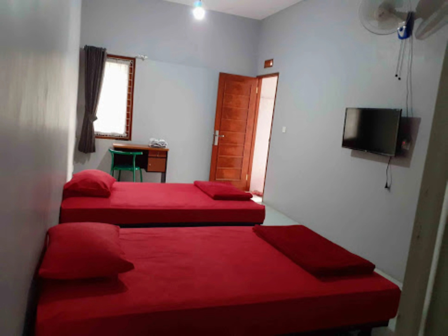 Nabila Syar i Guesthouse by ZUZU