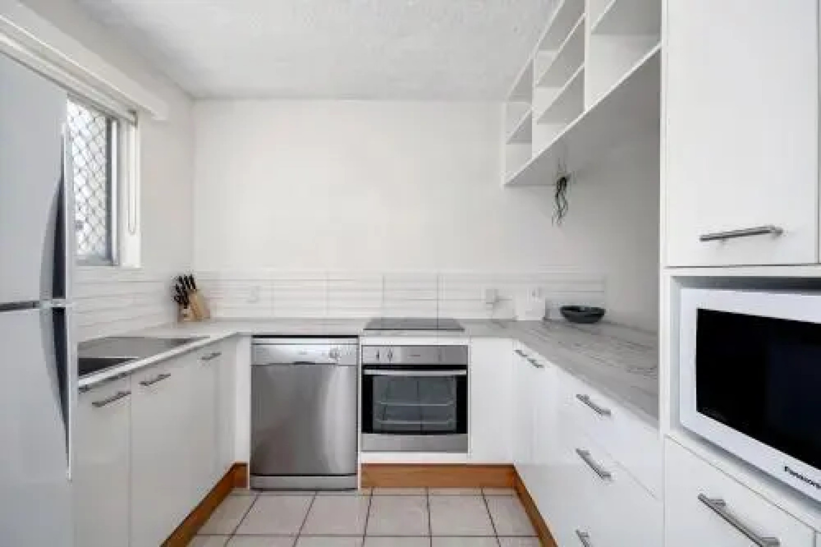 Beachcomber Unit 4,- Beachside Unit -