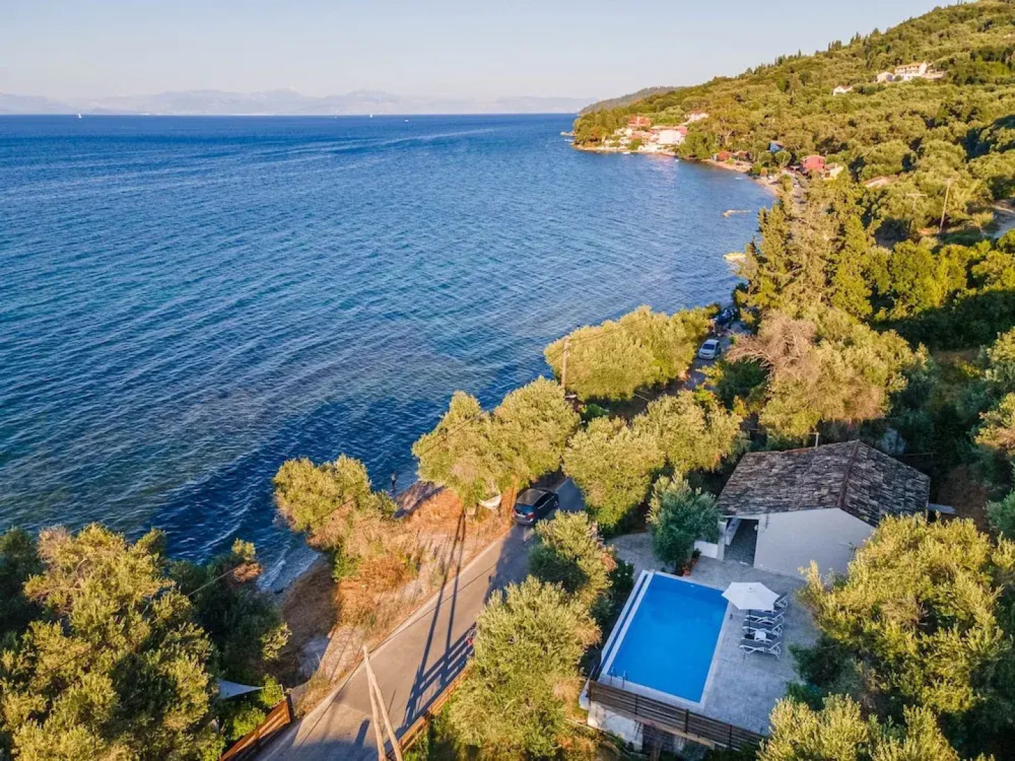 Deja Blue Beach Pool House by Estia