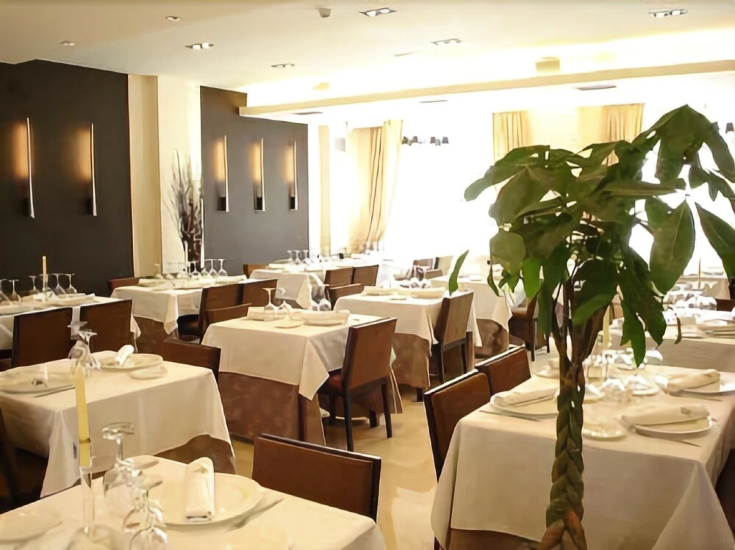 Hotel Asador H.M. Versus