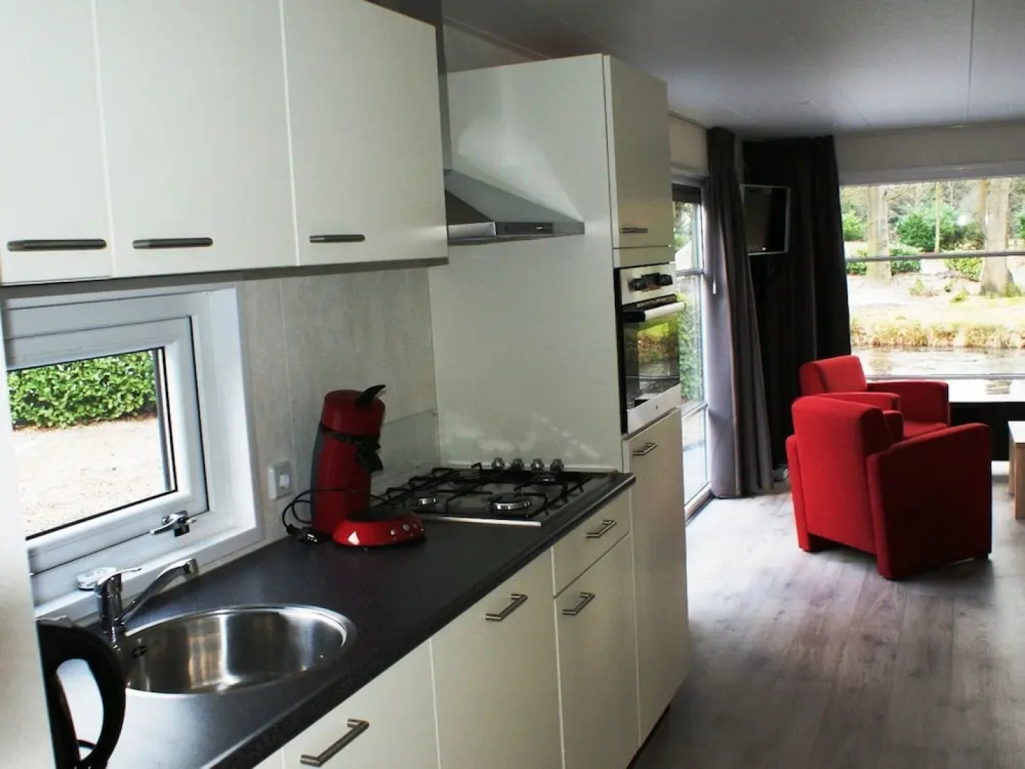 Modern chalet with two terraces and near a pond