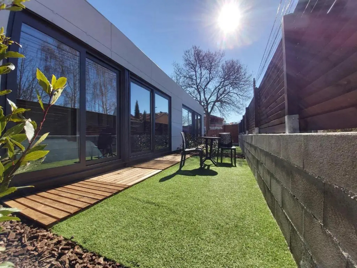 Acero y Piedra Apartamentos con jardín