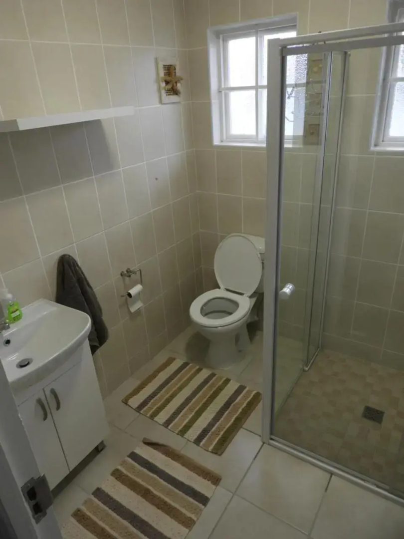 Cozy 4 bedroom house enclosed by sea and mountain.