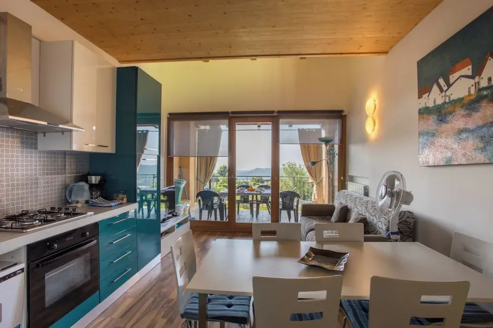 Blue Flat With Shared Pool and Private Garden Near Salò