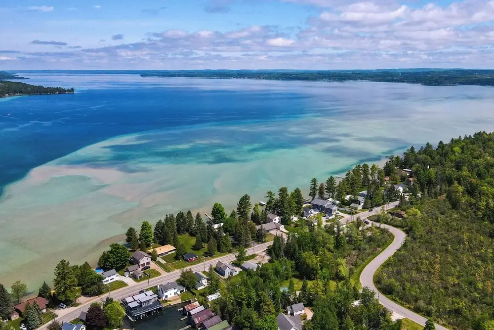 Modern Torch Lake Cottage w/ Dock Near Ski Resorts