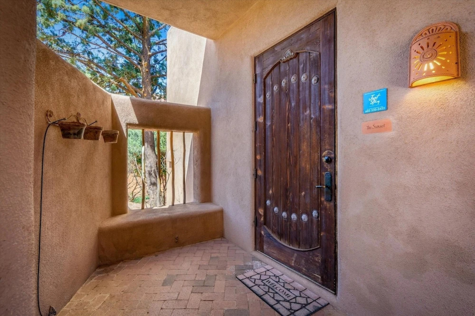 Adobe Village Inn by RedAwning