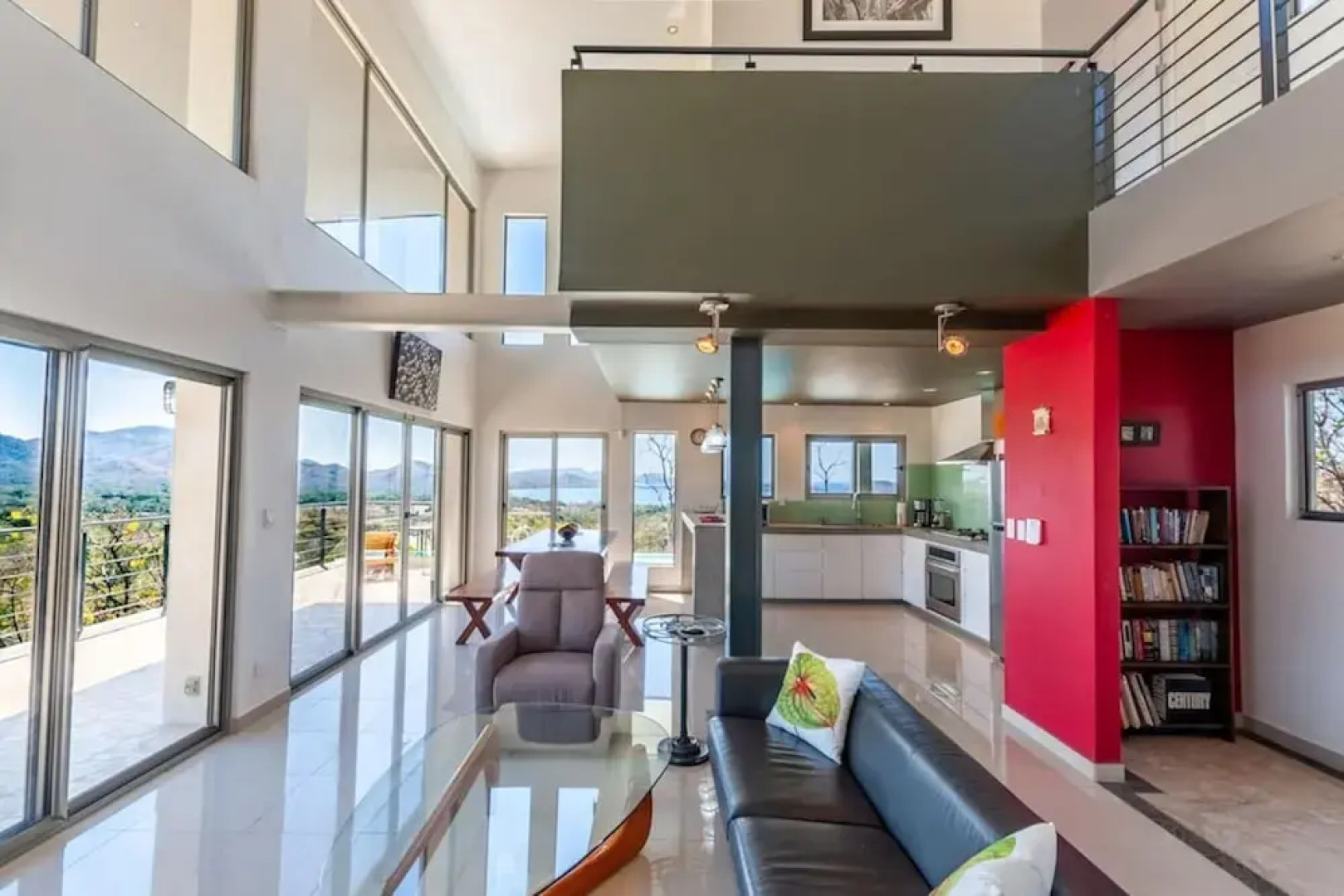 Modern Hillside Home with Sleek Interiors and Panoramic Poolside Views