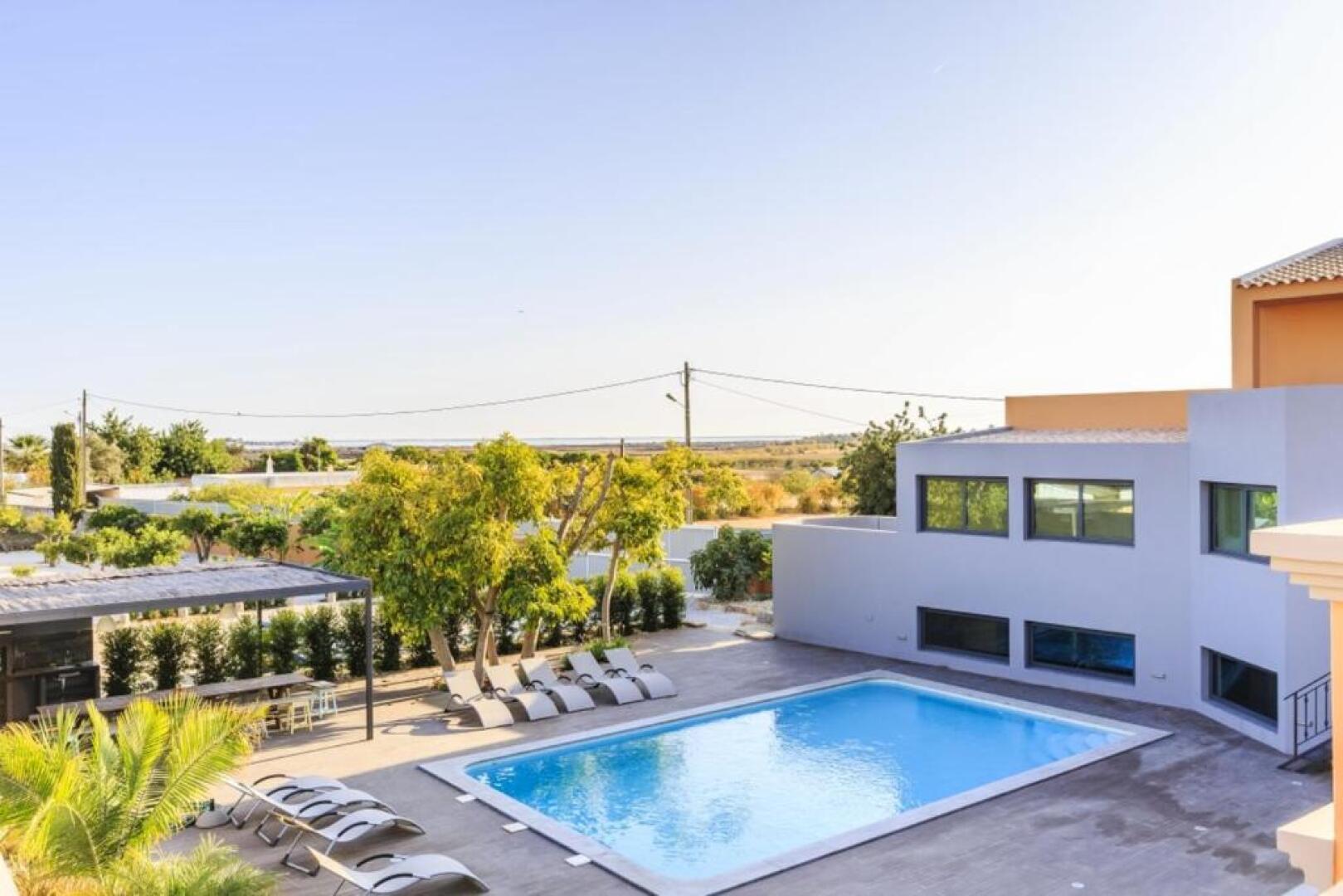 Villa with 3 bedrooms in Quelfes with wonderful sea view shared pool enclosed garden 4 km from the beach