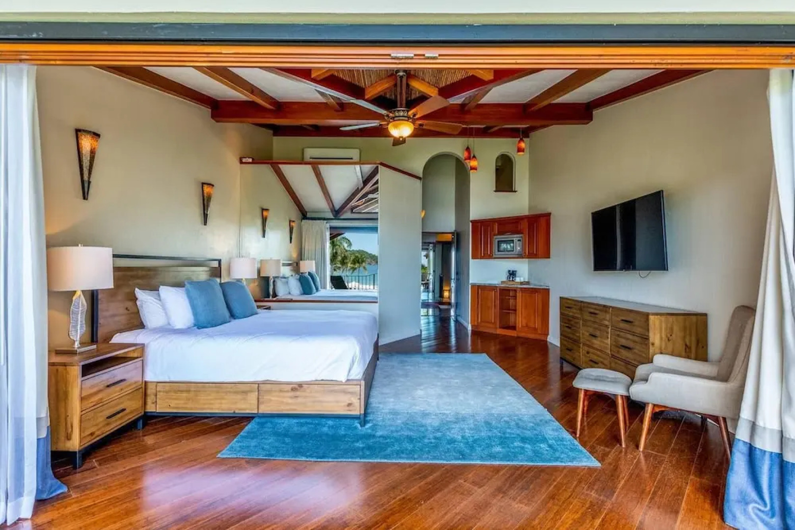 Stylish Split-Level Condo with a Shaded Terrace, Direct Beach Access, and Resort-Style Community Amenities