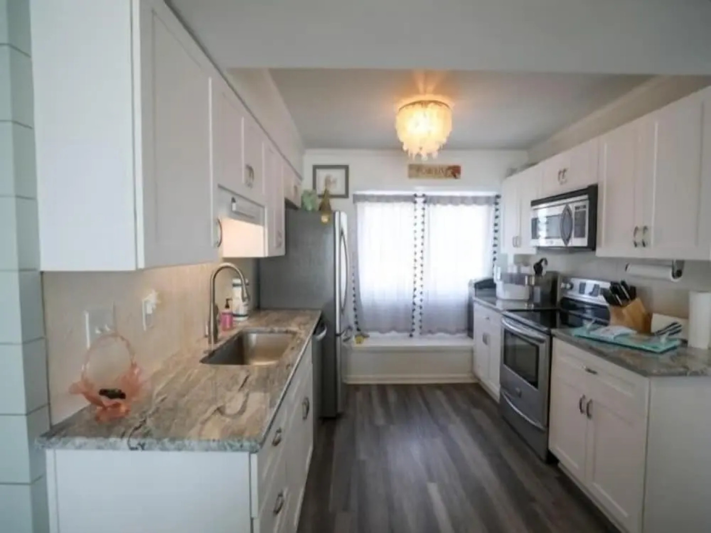 Beach Sunrise - Relaxing and Romantic! Enjoy ocean views from the bedroom with balcony access. 1 Condo by RedAwning