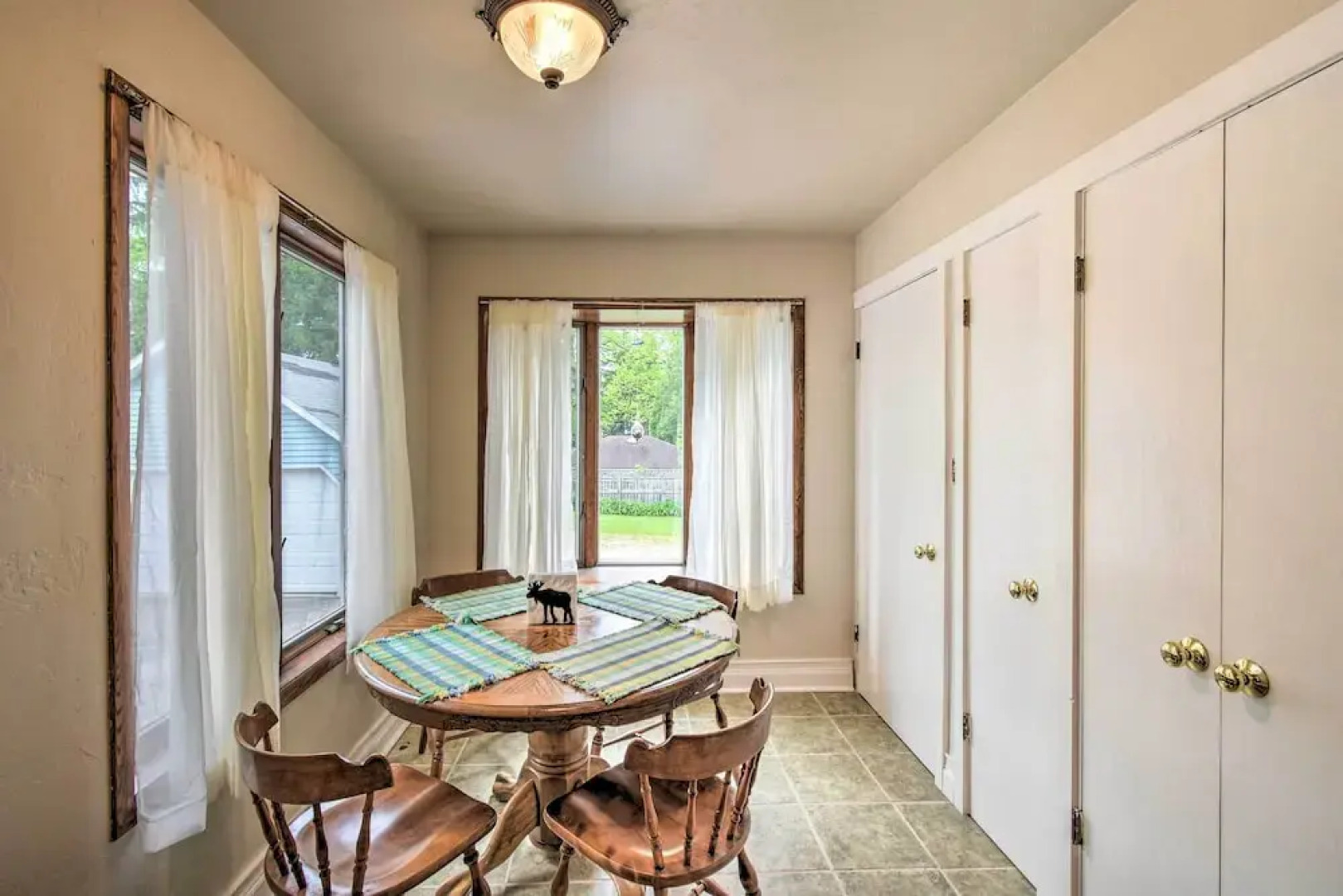 Walkable Lake Elkhart Apt: Dine, Shop, Swim!