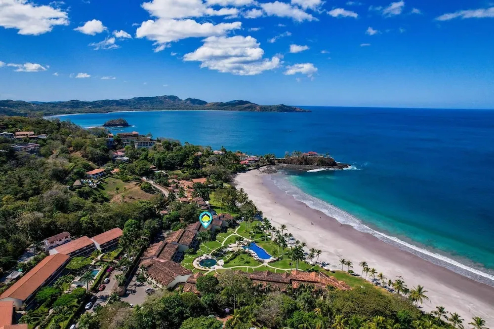 Luxury Beachfront Condo w/ High-End Wood Furnishings and Ocean Views in Exclusive Community