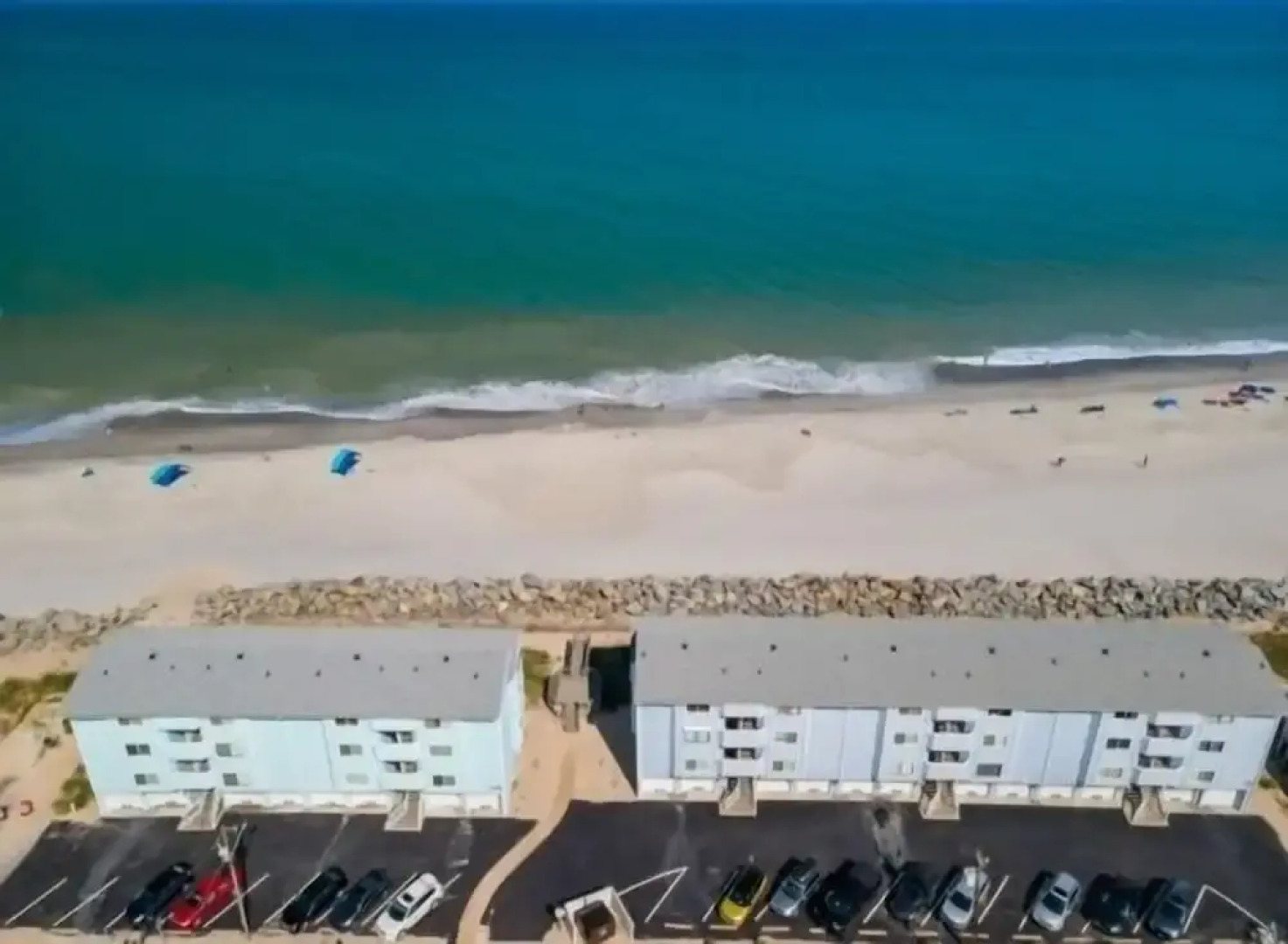 Beach Sunrise - Relaxing and Romantic! Enjoy ocean views from the bedroom with balcony access. 1 Condo by RedAwning