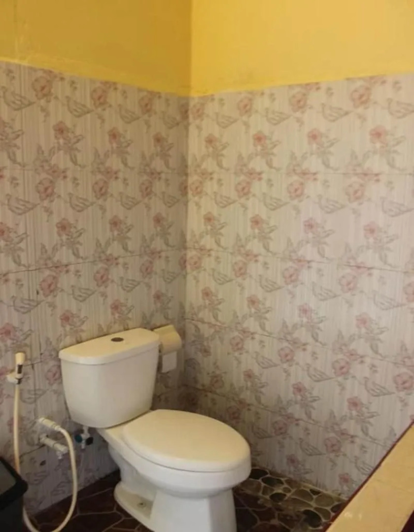 Penginapan Lakeside Cottages by ZUZU