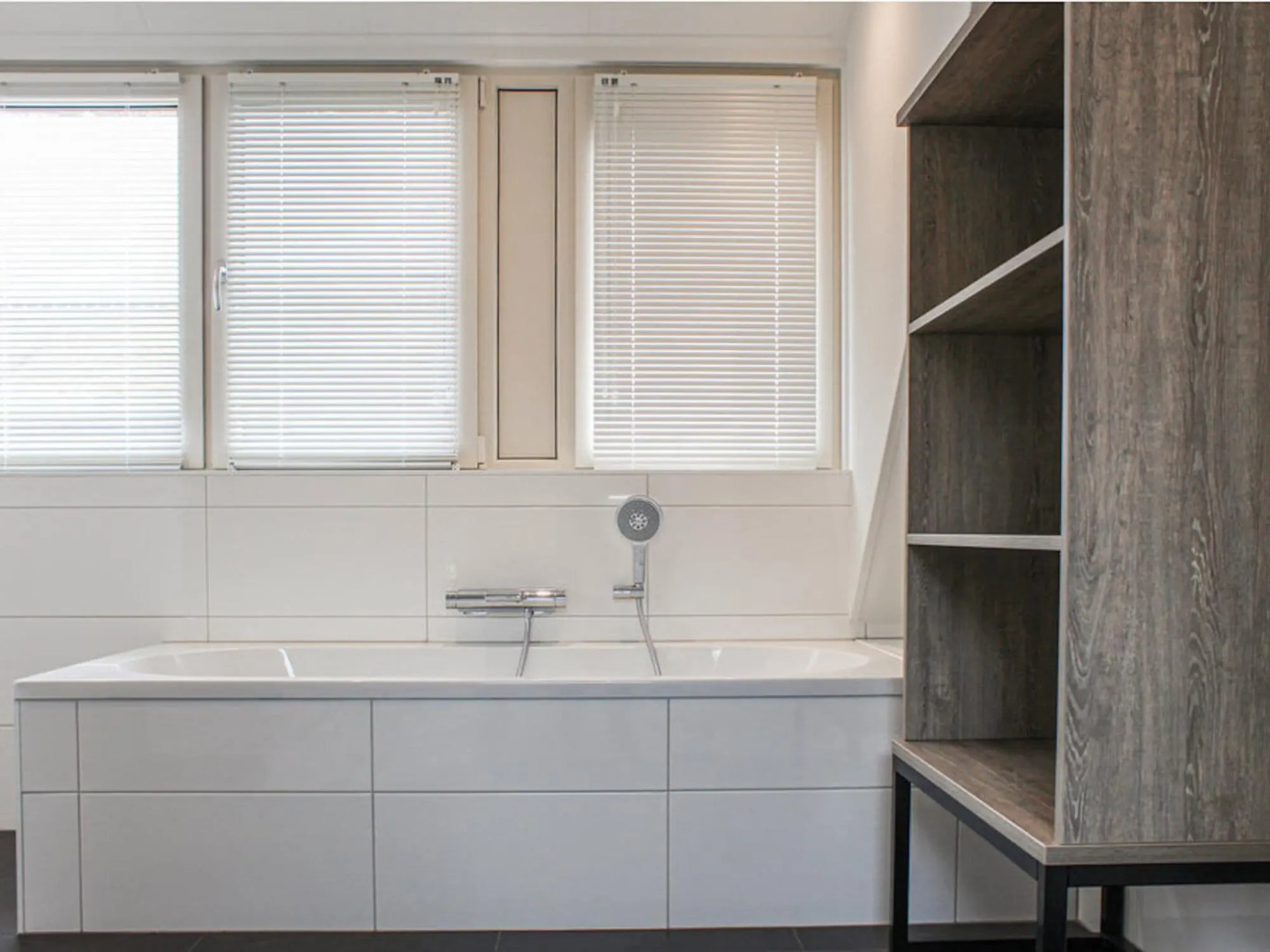 Villa with enclosed garden, in a holiday park on the water in Friesland