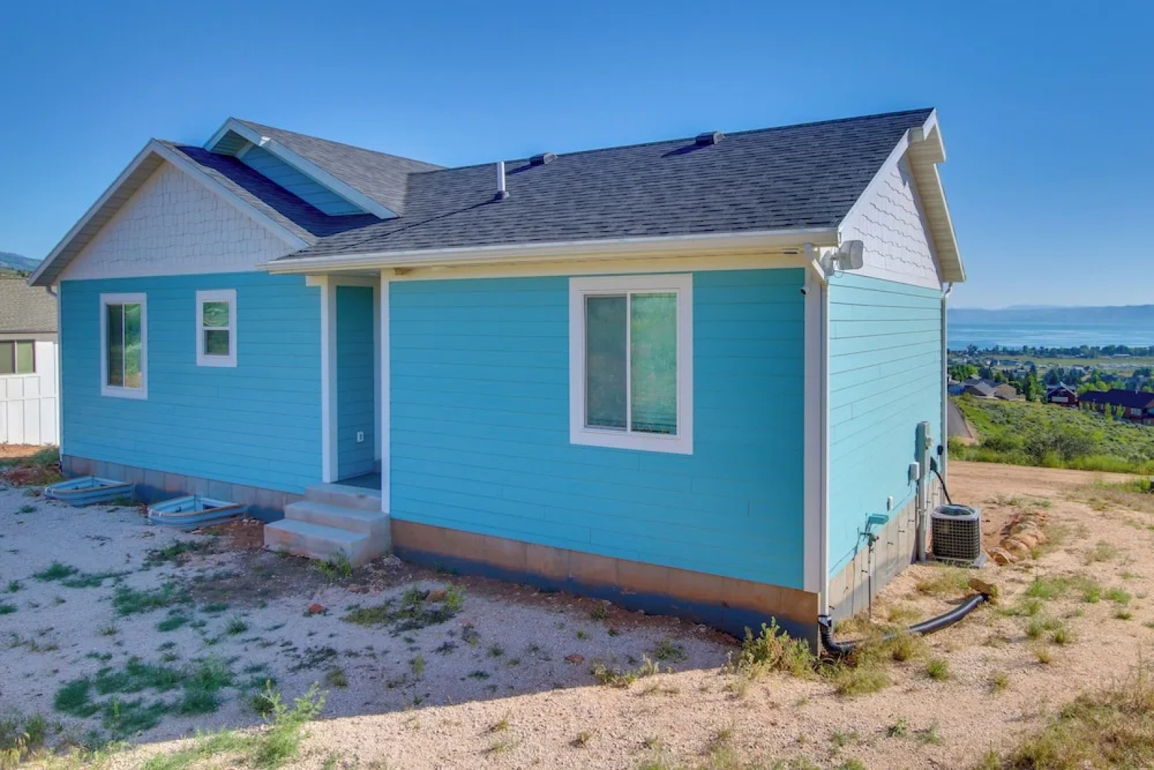 Pool Access & Lake Views: Modern Garden City Home