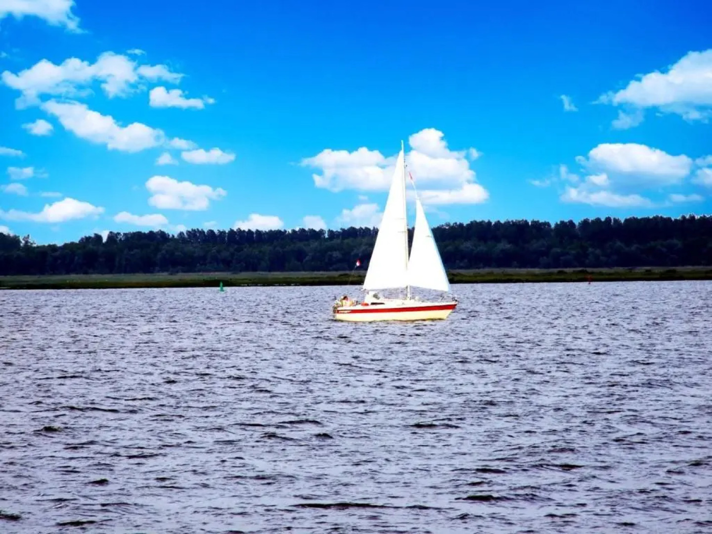 4 pers Mia Holiday home with lake view in front of the Lauwersmeer